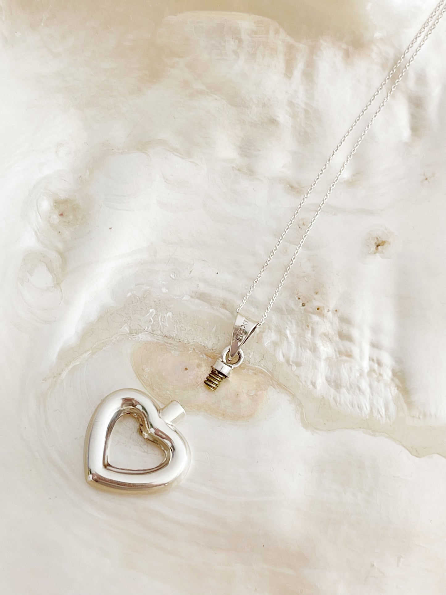 Silver Heart Perfume Bottle Necklace.