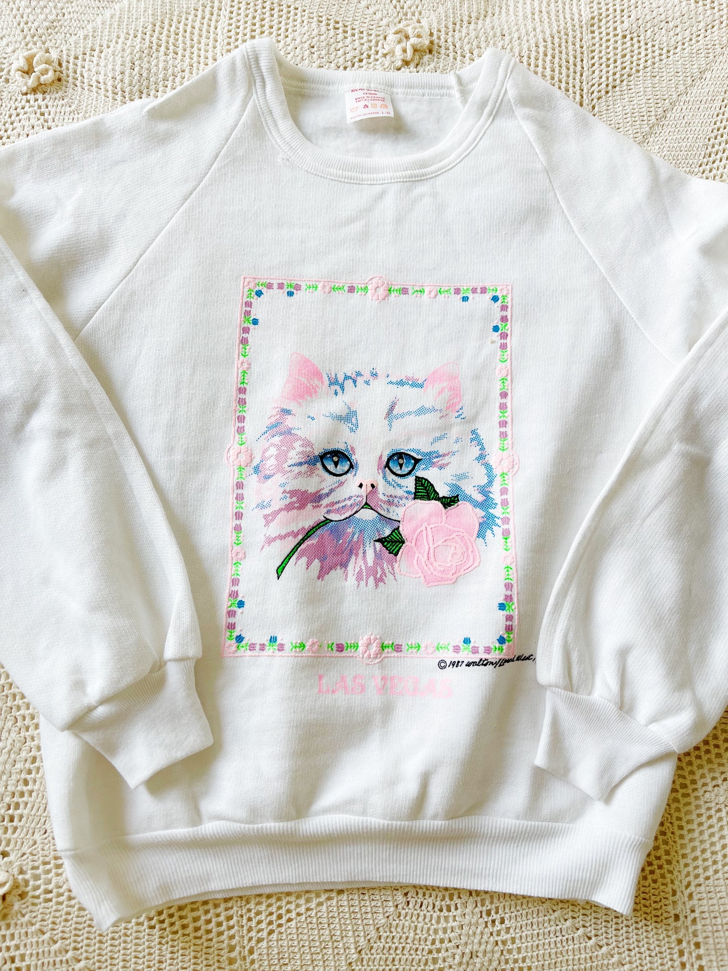 1987’s White Cat Sweater.