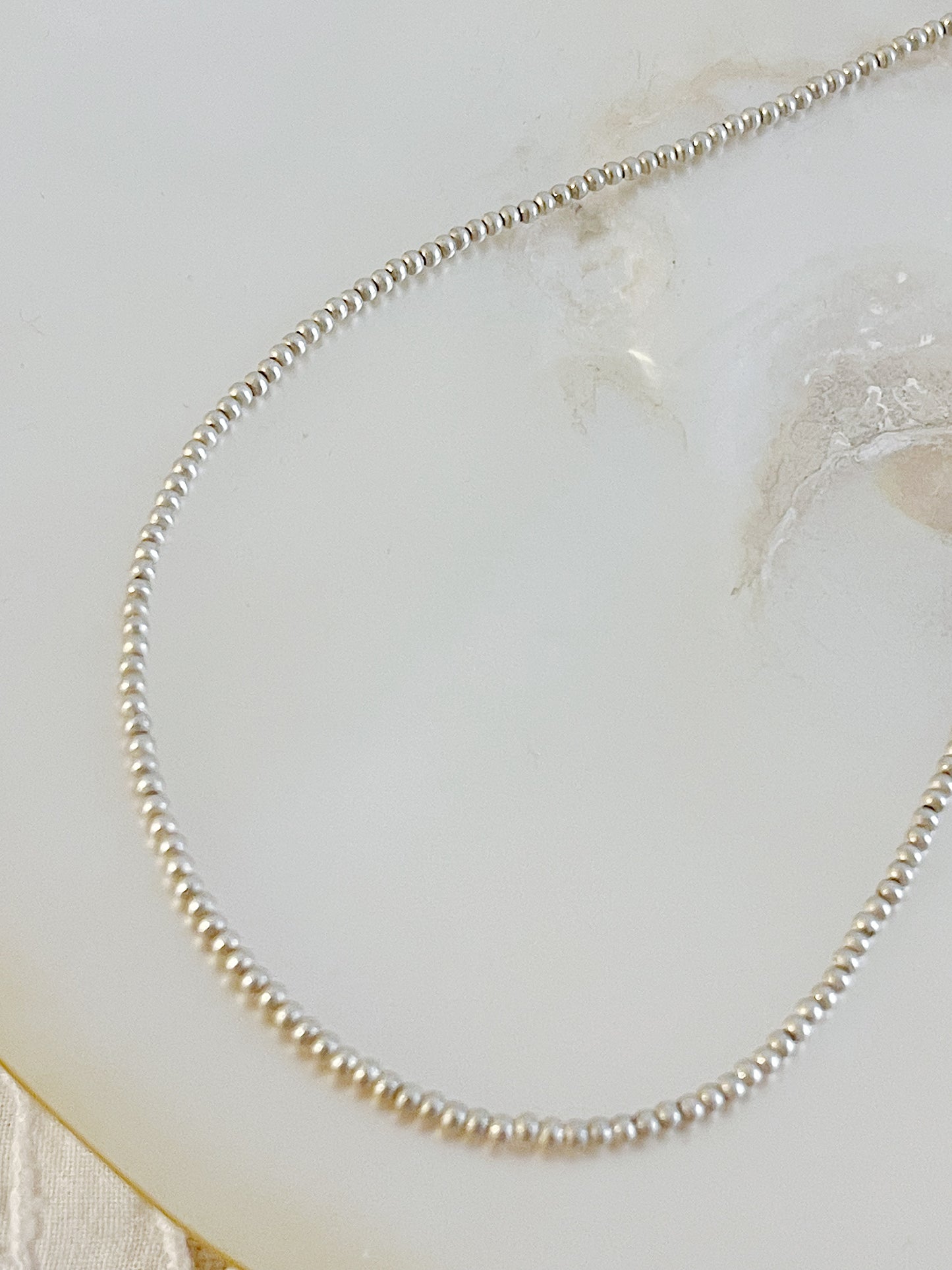 Navajo Shiny Micro Pearl Necklace 2mm 20 inc.